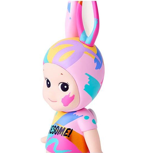 Two colorful toy figures with abstract designs on a white background