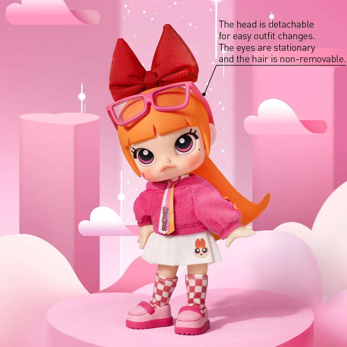 A pink-themed product image featuring a doll character with orange hair, a large red bow, pink glasses, a pink jacket, white skirt, and checkered socks, standing on a pink platform. The background is pink with clouds, stars, and text reading 'GIRLS ROCK!' and descriptive feature callouts.