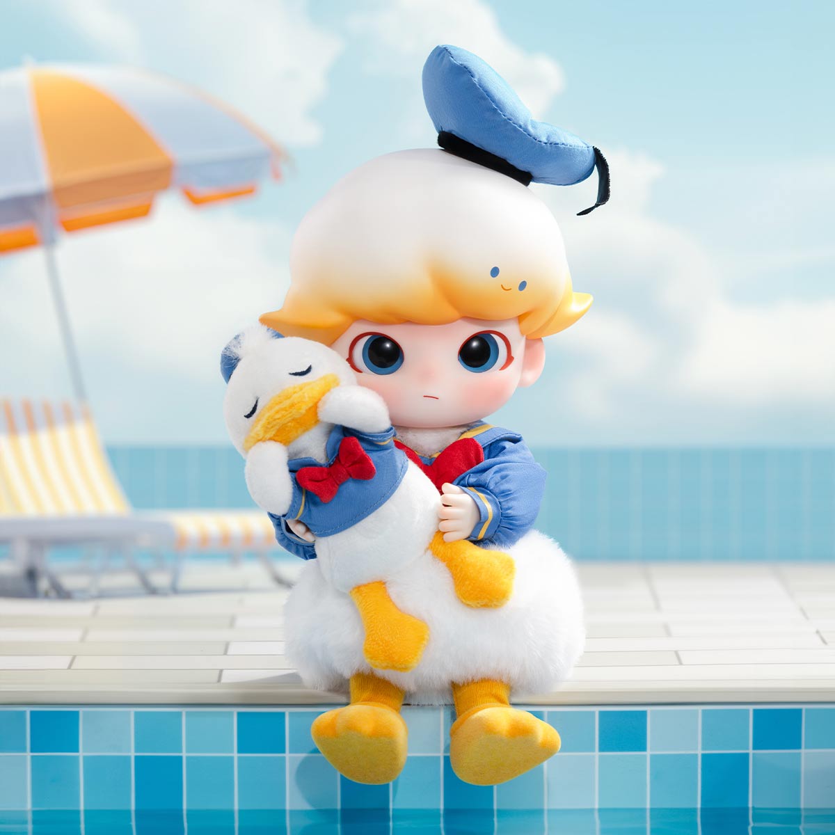 Plush toy of a character with a duck-like appearance sitting on a ledge by a pool.