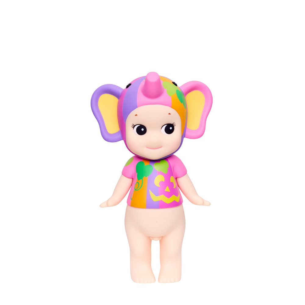 Colorful toy figure with elephant ears on a white background