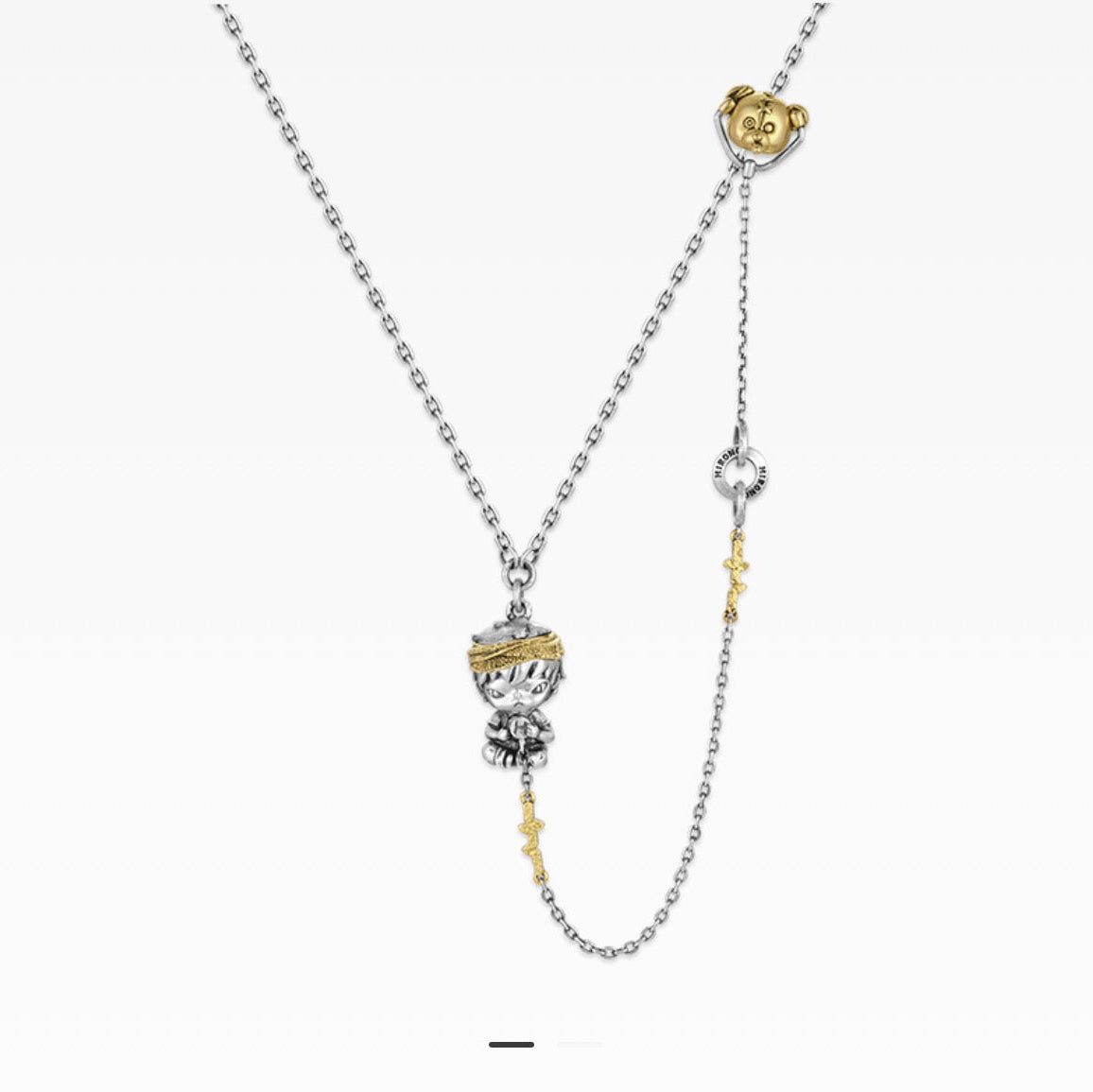 hirono Necklace with a detailed pendant on a white background
