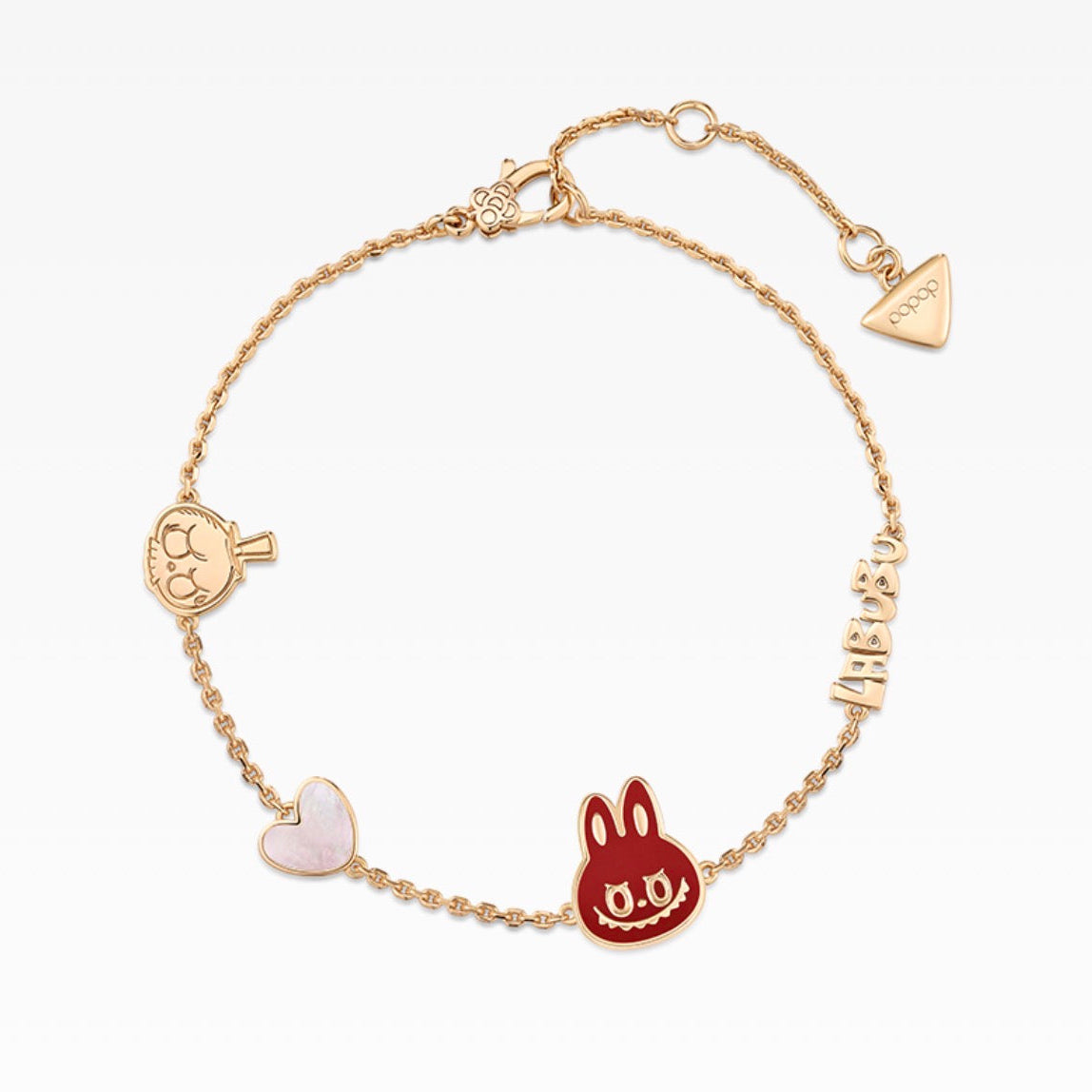A gold chain bracelet featuring multiple charms, including a red rabbit head, a pale pink heart, a small gold heart, and a vertical gold 'LOVE' charm, displayed on a clean white background.