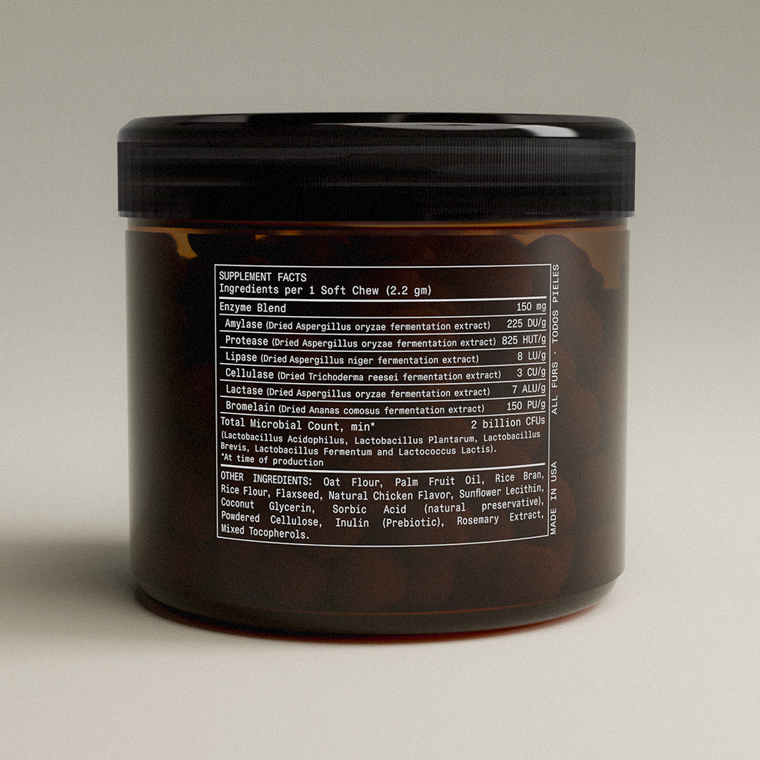 Brown container with black lid on a beige background