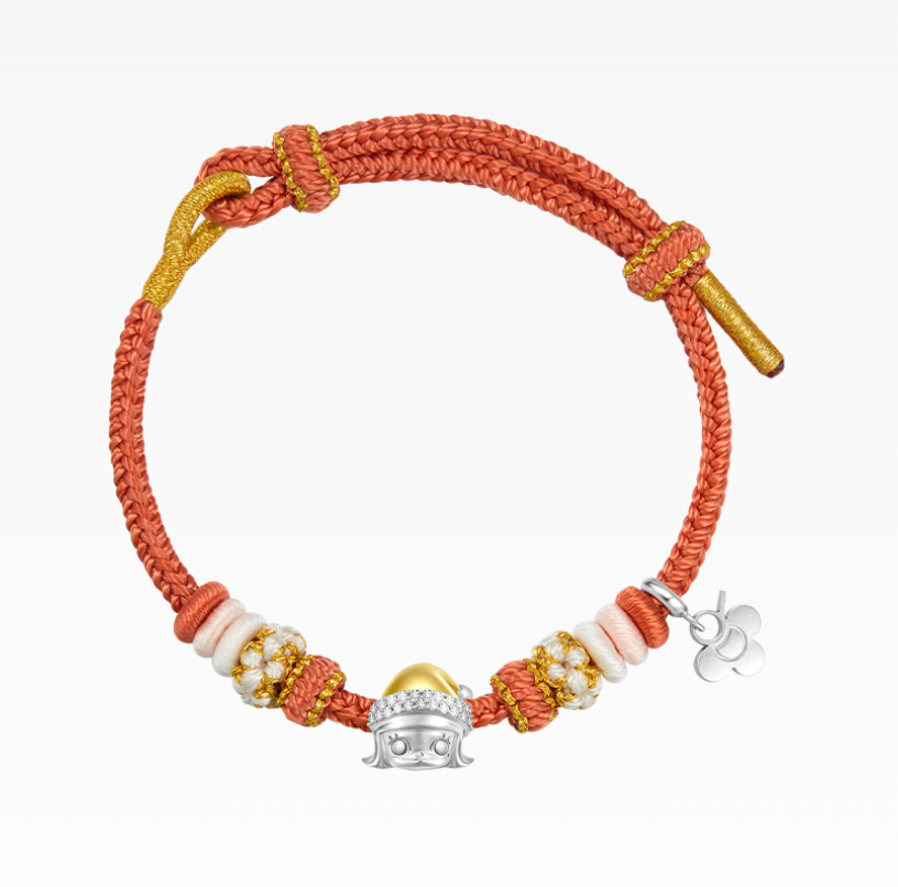 POPOP Molly Soft Woven Fabric Silver Bracelet with coral cord, gold accents, and decorative beads on a white background