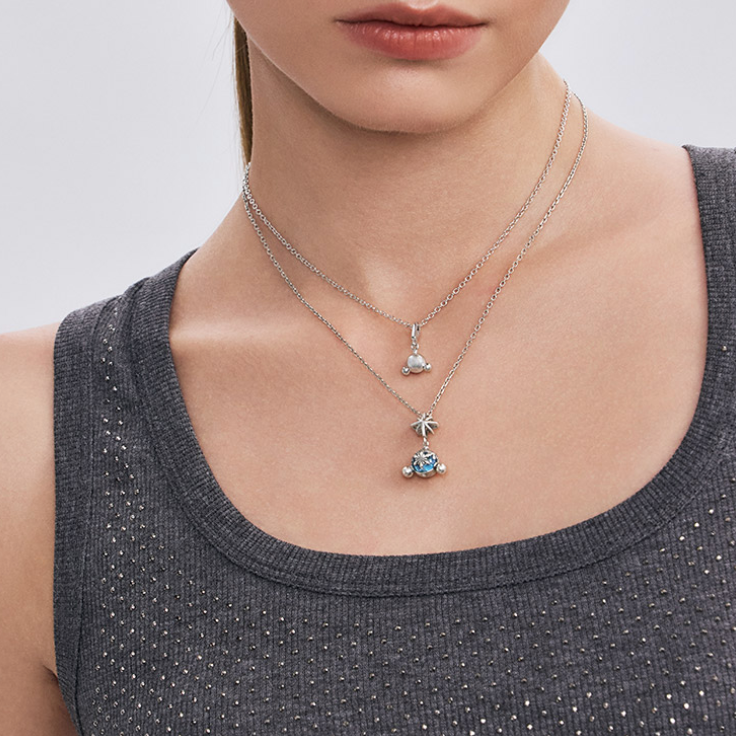 Close-up of a person wearing Skullpanda Icon Pendant Necklace