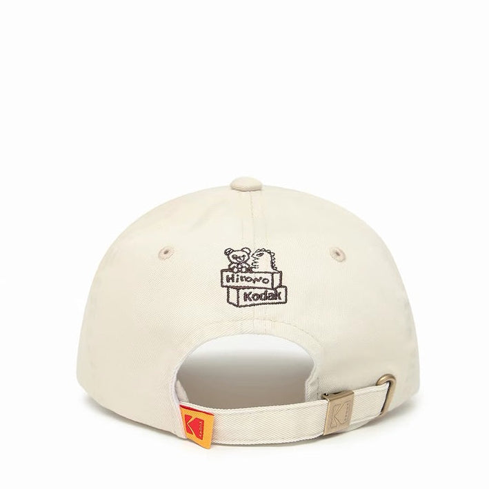 Hirono x Kodak Baseball Cap cream side and back view