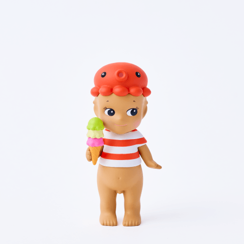 Two toy figures with red hair and striped outfits on a white background