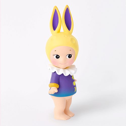 Two toy figures with bunny ears on a white background