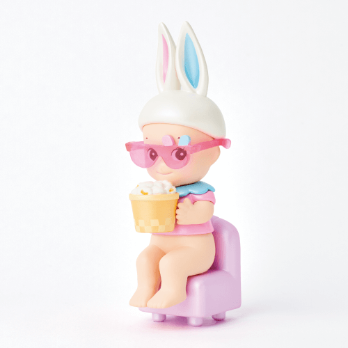 Two cartoon-like figurines with bunny ears and sunglasses holding ice cream on a white background