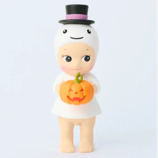 Two Halloween-themed figurines on a white background