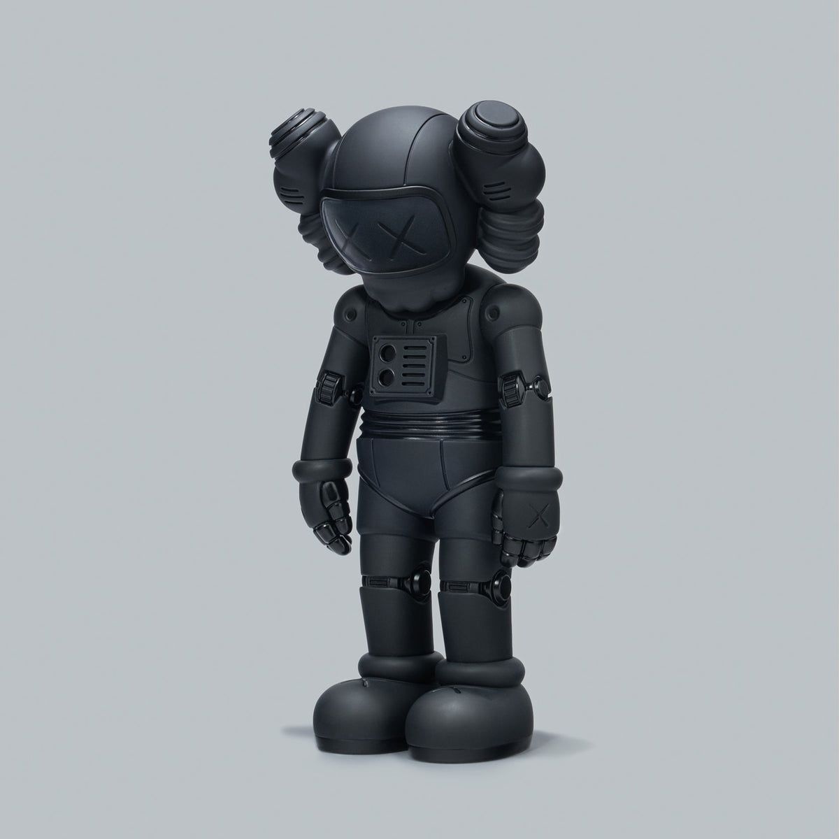 KAWS:HOLIDAY HANGZHOU COMPANION vinyl figure in black, three-quarter view