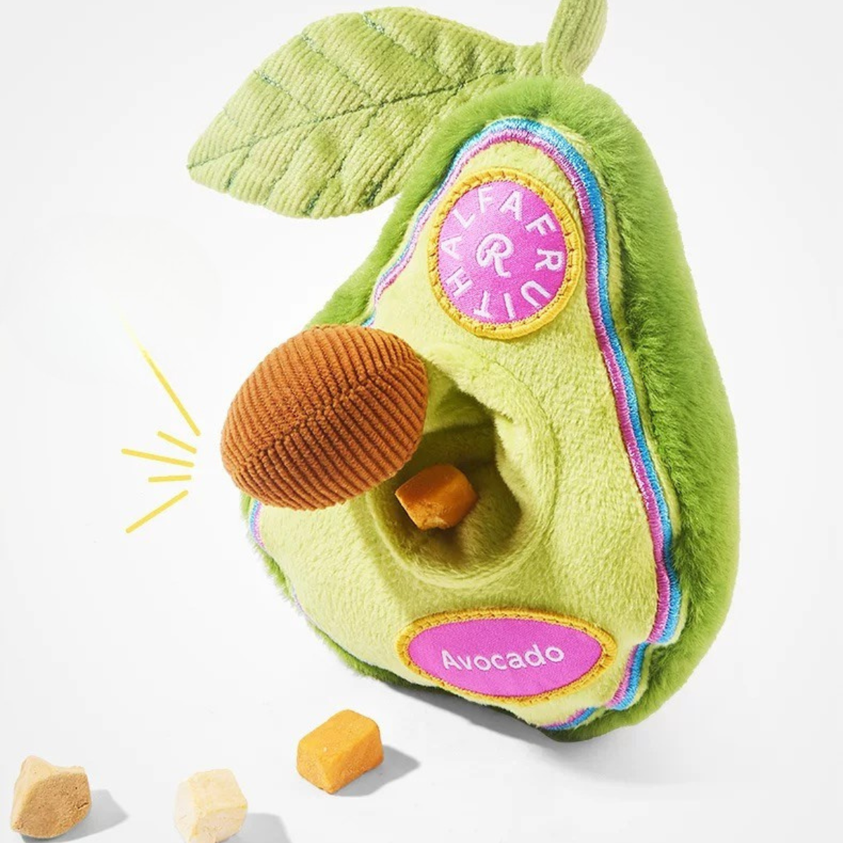 Plush avocado toy with a colorful label on a white background