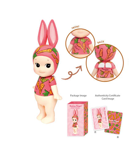 Two dolls with different outfits, packaging, and certificates displayed on a white background.